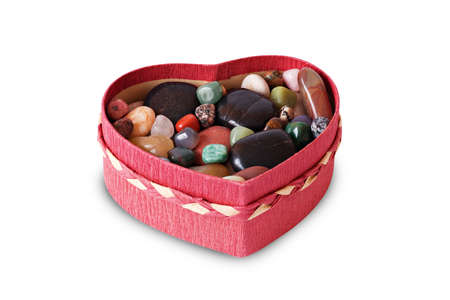 box of heart shape with colorful stonesの写真素材