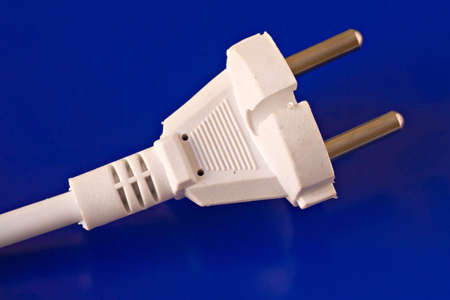 white power plug isolated on blue background