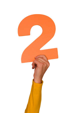 number two in hand,isolated on white backgroundの写真素材