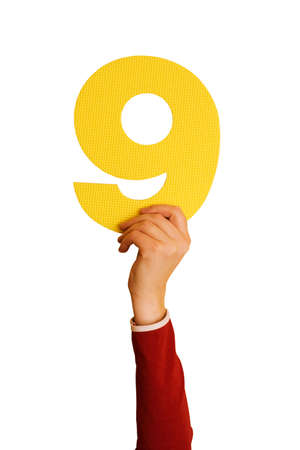  number nine in hand,isolated on white backgroundの写真素材