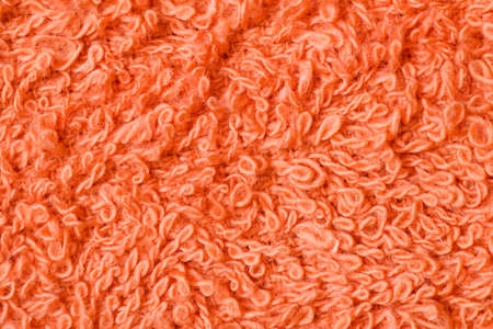 Detail shot of orange fleecy towel - close-upの写真素材