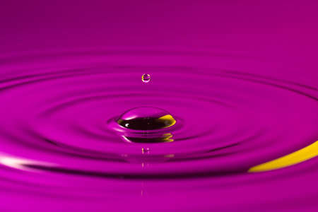 serenity conceptual. little droplet falling in a waterの写真素材