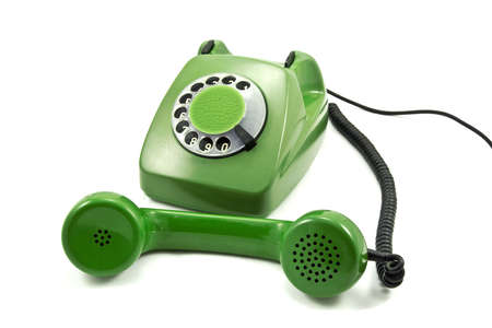  	Old-fashioned green analogue phone on a white backgroundの写真素材