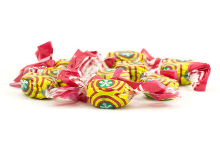 colorful caramel sweets,isolated on white backgroundの写真素材