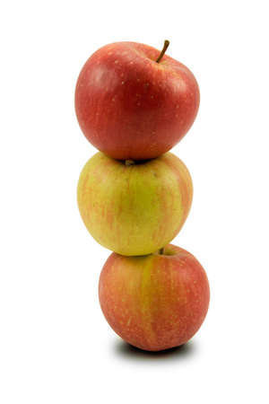 stack of three apples,isolated on white backgroundの写真素材