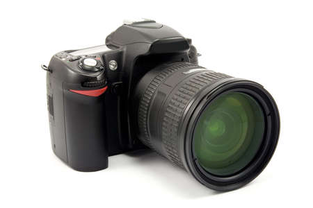 photo camera with zoom lens over whiteの写真素材