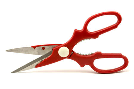 Scissors with red handle on white background の写真素材