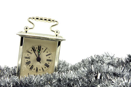 New Year coming. clock showing five minutes to midnight