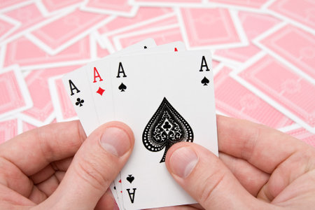 concept for gamble . hands with three aces.