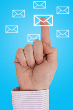 Interactive communication concept. Figer pointing letter iconの写真素材