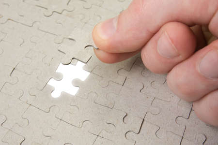 puzzle piece coming down into it