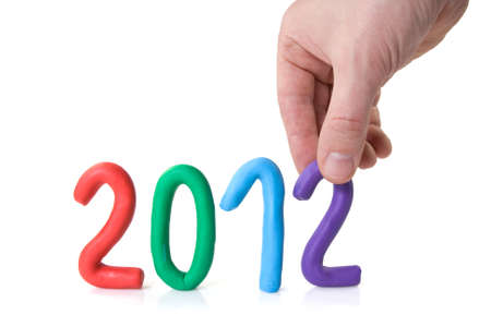 Hand put plasticine figures 2012, new year concept の写真素材