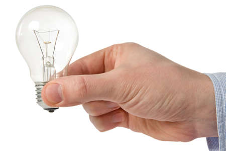 man holding light bulb in his hand - creativity concept の写真素材
