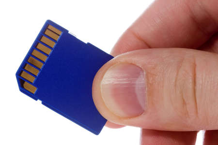 hand with blue sd memory card. isolated on white background