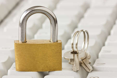 padlock with a keys on computer keyboardの写真素材