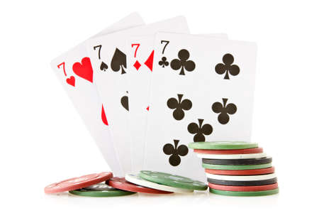 Cards and chips for poker on white background