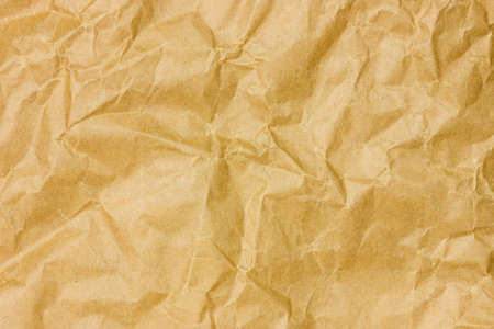 Brown crumpled paper sheet, can be used as background or texture