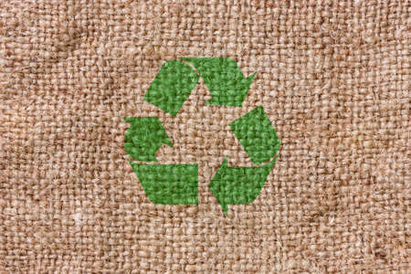 Eco bag background  with green recycle signの写真素材