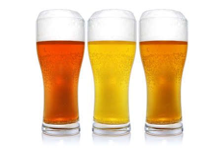 Three glasses with different beers on a white background