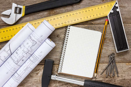 Twisted technical drawing and tools with blank notebook for your text 
