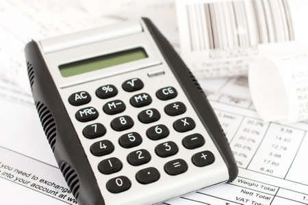 Check and consider purchases on the calculatorの写真素材