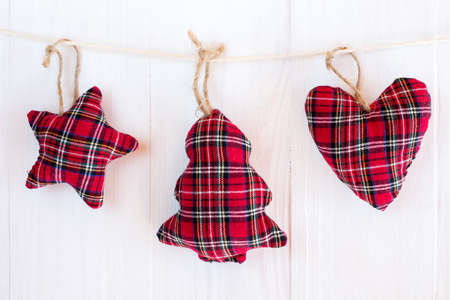 Christmas ornaments hanging outdoor on the rope
