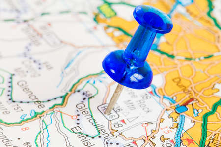 Pushpin on a tourist map. Travelling,  and tourism concept