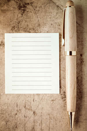 Wooden pencil and empty paper note for your textの写真素材