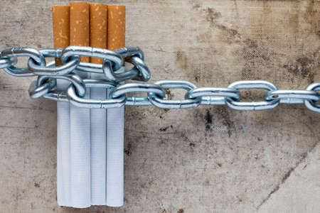 Chained cigarettes. Conceptual image for stop smoking