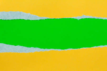 Torn yellow paper with a green background for your text