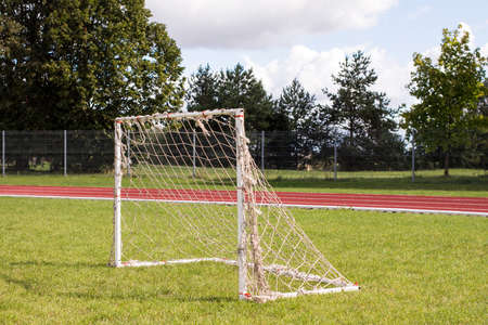 Small soccer gates for training on green fieldの写真素材