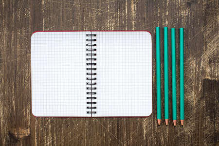 Personal organizer and four pencil.Copy-space for your text.の写真素材