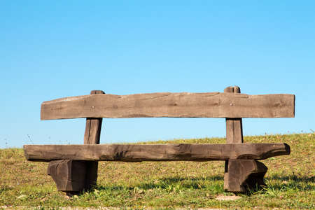 Wooden bench with the look at blue skyの写真素材