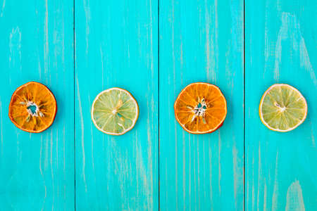 Four dry slices of orange and lemon . The benefits of fruit.の写真素材