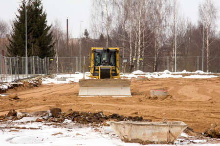 Bulldozer at work on new construction site