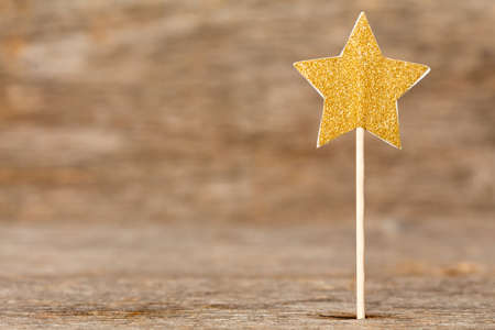 Golden Star for Christmas or birthday party decorationの写真素材