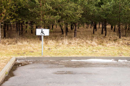 Sign of disabled person on the parkingの写真素材
