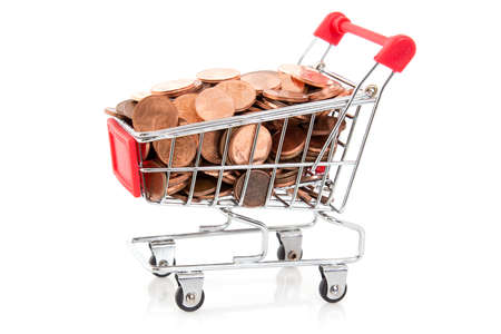 Shopping cart with Euro cent coins,isolated on white backgroundの写真素材