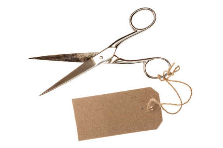Metal scissors with blank tag,isolated on white background