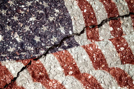 USA flag on cracked asphalt backgroundの写真素材