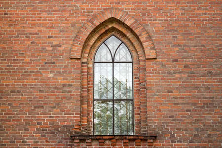 Window of the old Catholic churchの写真素材