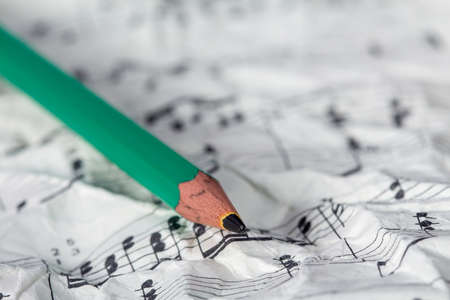 Music notes and pencil, shallow DOFの写真素材