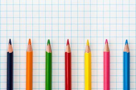 White square paper sheet and colored pencilsの写真素材