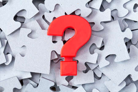 Puzzle pieces and question mark. Concept for goals, tasks and ways of their solution の写真素材