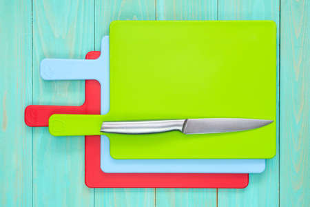 Set of cutting boards with a kitchen knife.Top view.の写真素材