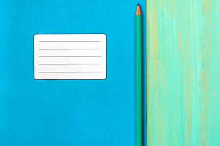School notebook and pencil on table.Copy-space.の写真素材