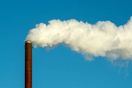 Smoke comes from rusty pipe.Climate changing and pollution concept