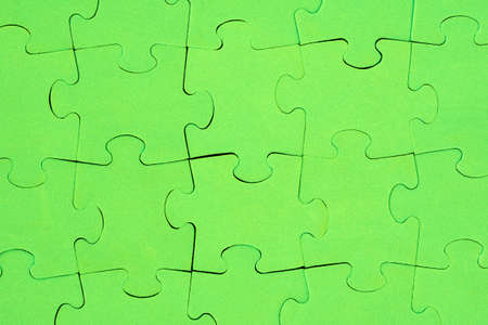 Green Jigsaw puzzle, can be used as backgroundの写真素材