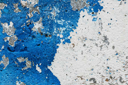 Grungy wall with peeling blue paintの写真素材