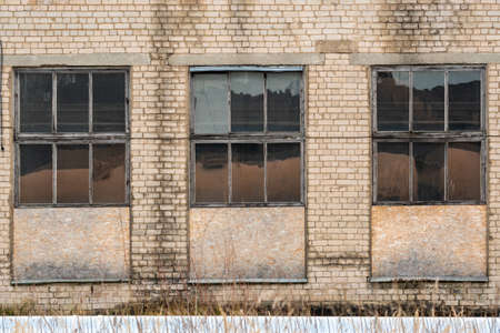 Windows in an old abandoned industrial buildingの写真素材